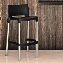 Tabouret professionnel bar en polypro noir en intérieur